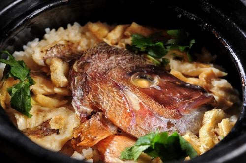 Red sea bream rice cooked in a pot
