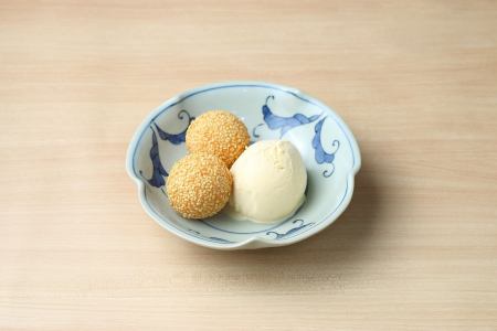 Sesame dumplings and vanilla ice cream