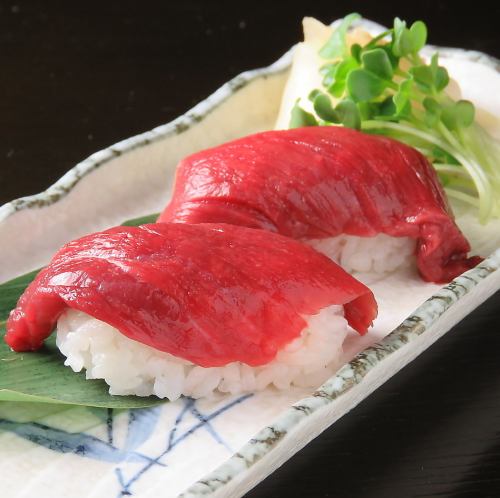 2 pieces of horse sashimi