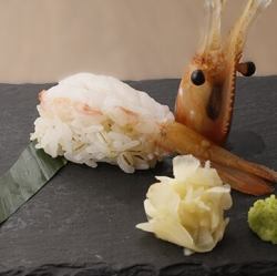 1 piece of button shrimp nigiri