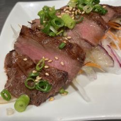 Beef tongue with sliced onions and ponzu sauce