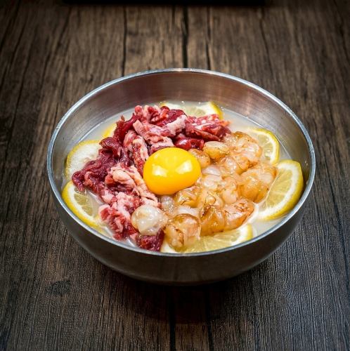 Lemon cold noodles topped with Yukhoe Saew