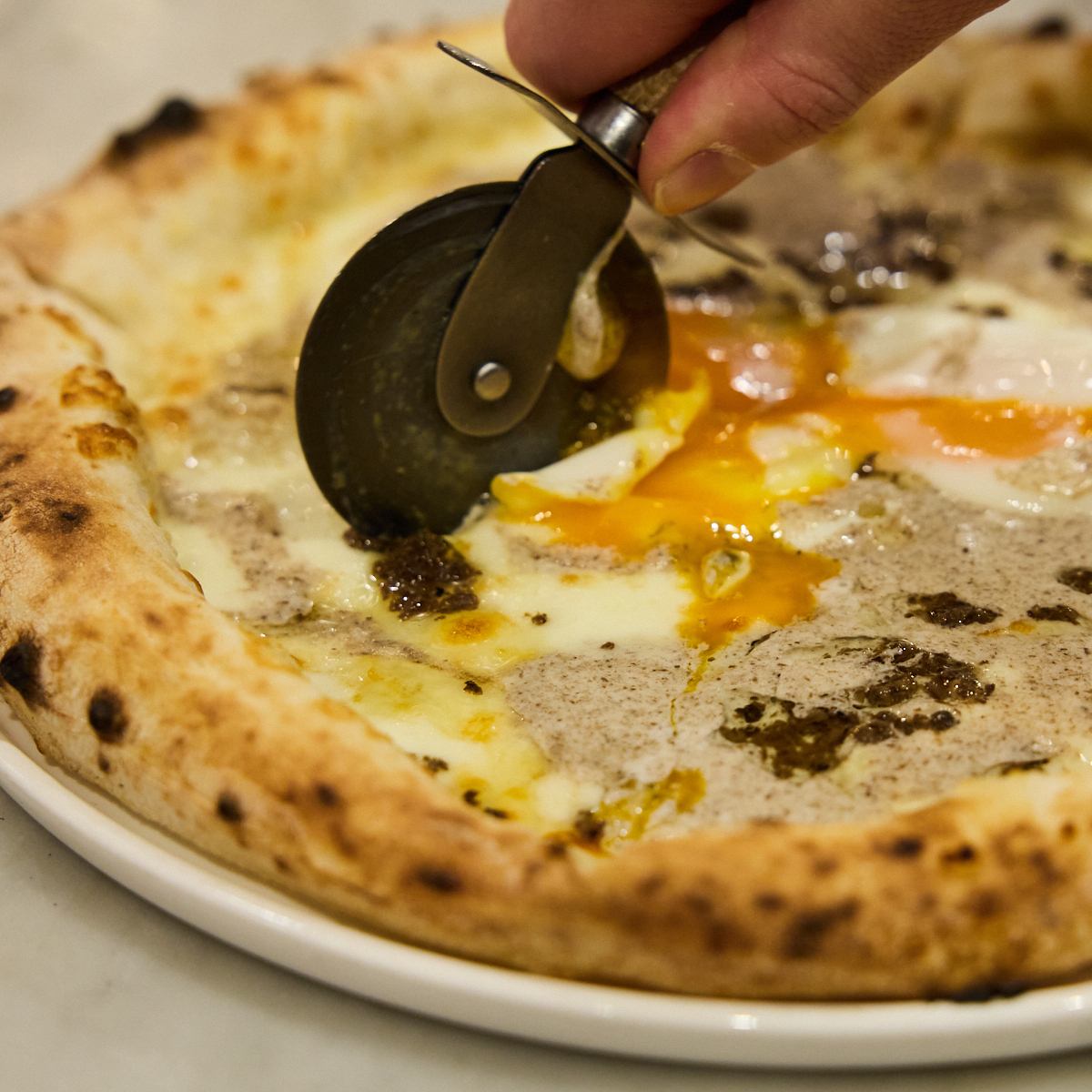 Authentic Italian cuisine prepared by a chef trained in Italy! Our recommended wood-fired pizza!