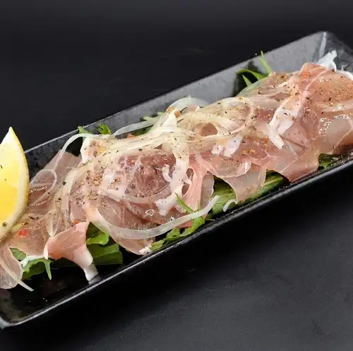Prosciutto and mizuna lemon carpaccio
