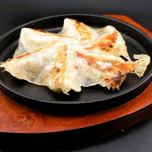 Pan-fried dumplings with crispy edges