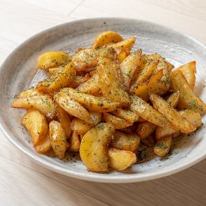 Large potato with rock salt butter and herbs