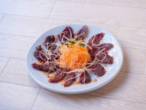 Grilled horse meat carpaccio