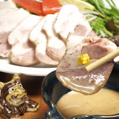 Steamed local sake of Kyoto red chicken, sesame pon