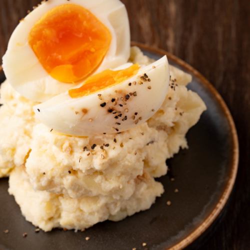 Minced potato salad with soft-boiled eggs