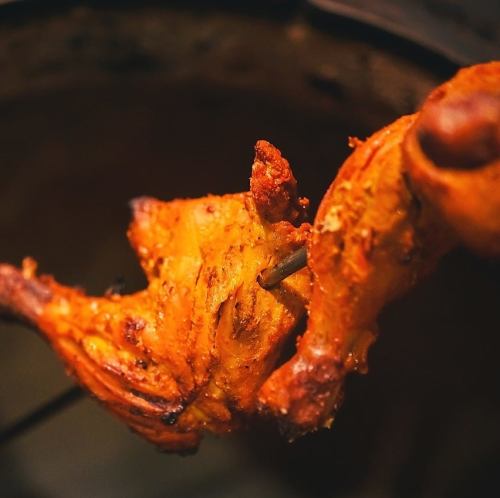 Tandoori chicken cooked in an authentic pot!