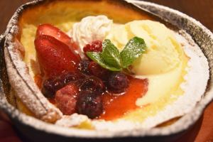 Dutch baby with lots of berries