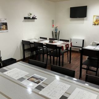 There are two tables for four people.