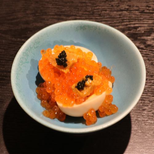 Sea urchin salmon roe on the boiled egg