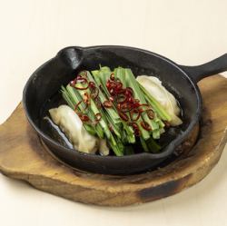 Fried dumplings in rich chicken broth