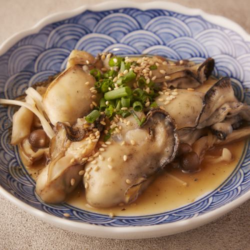 Sauteed oysters and mushrooms in butter