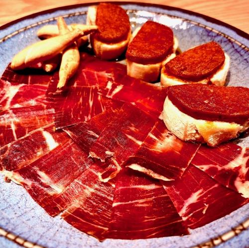 Assortment of two kinds of Serrano Jamon and Mallorca specialty Sobrasada