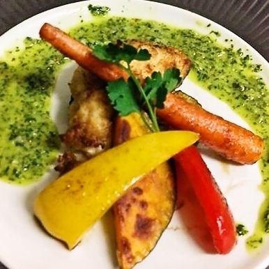 Grilled chicken thigh with basil sauce