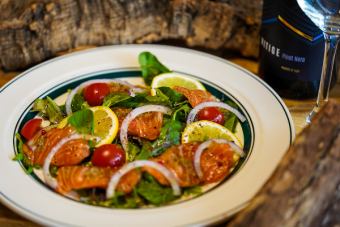 Homemade smoked salmon, red onion and capers