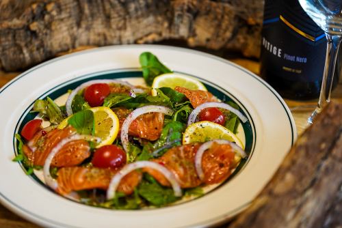 Homemade smoked salmon, red onion and capers