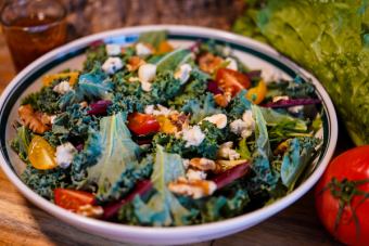 Green salad with roasted cashew nuts and gorgonzola, raspberry vinaigrette