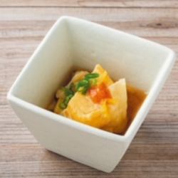 Rolled egg with yuba sauce