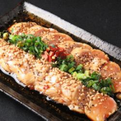 Specialty: Chicken fillet pickled in sesame seeds