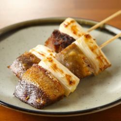 Beef tongue and green onion skewers