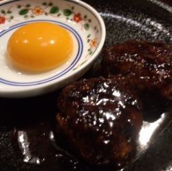 Two beef tongue meatballs with egg yolk