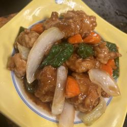 Sweet and sour pork on an iron plate