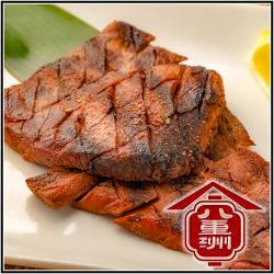 Thickly sliced grilled beef tongue