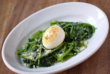 Sautéed spinach with soft-boiled eggs and parmesan