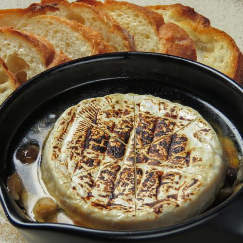 Autumn salmon and mushroom camembert cheese ajillo