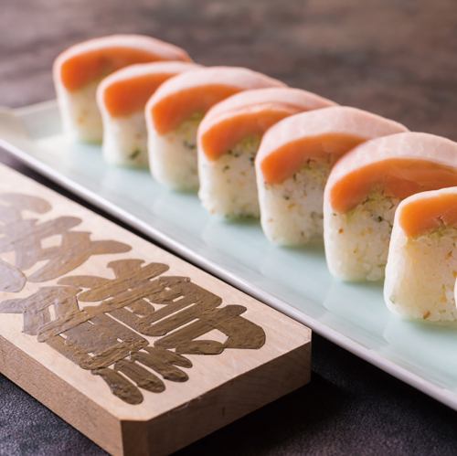Stick-shaped sushi with cherry salmon