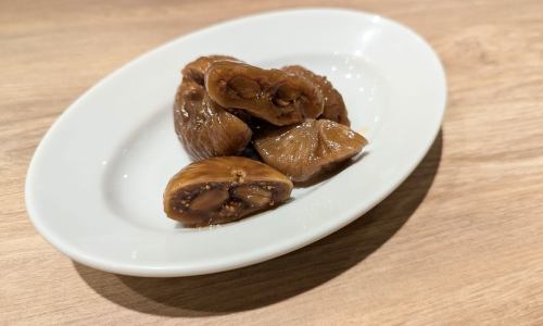 Dried figs stuffed with almonds and soaked in white wine