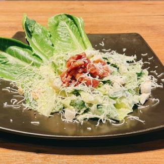 Caesar salad with homemade pancetta and romaine lettuce