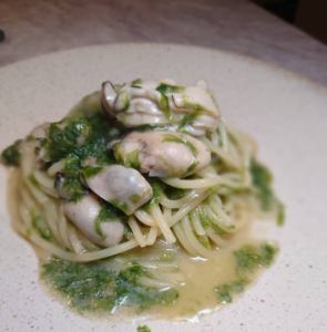 Mochilini with Hiroshima oysters and fresh seaweed sauce