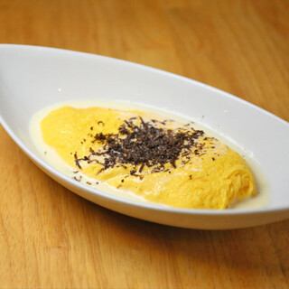 Fluffy omelet with truffle and borcini white sauce