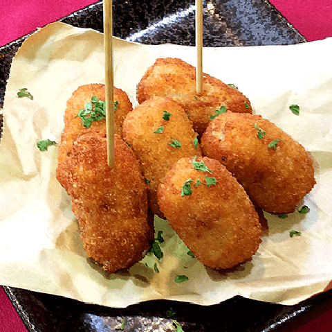 Bite-sized prosciutto croquettes