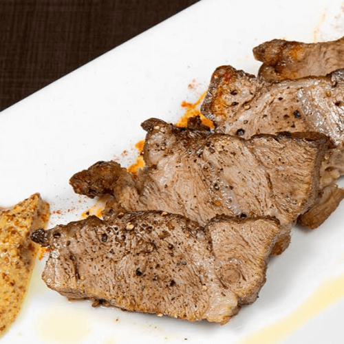 Thick-cut roasted Iberian pork from Spain