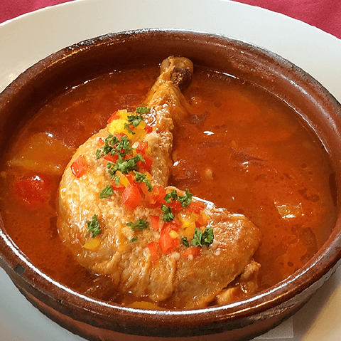Spanish-style tomato stew with bone-in chicken