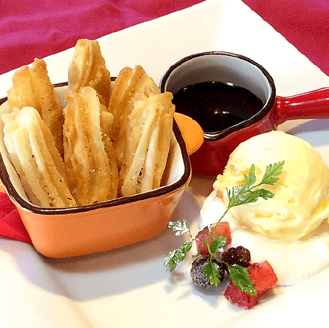 Churros & vanilla ice cream with hot chocolate sauce