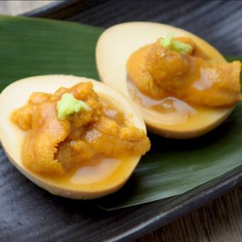 Boiled egg topped with Sanriku sea urchin