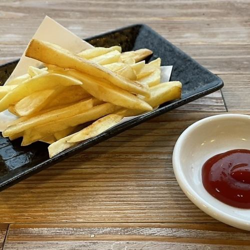 Homemade domestic fries with ketchup