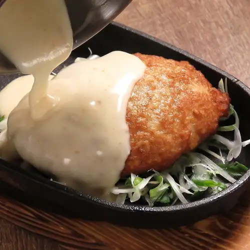 Homemade chicken meatballs with melted cheese