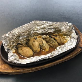 Oysters grilled in butter foil