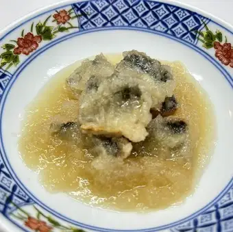 秋刀鱼南蛮渍萝卜酱（用萝卜泥酱汁炖煮腌秋刀鱼）