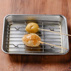 北海道産じゃがバター串~塩辛バターソース~