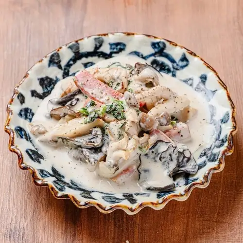 Sautéed three kinds of mushrooms in porcini sauce