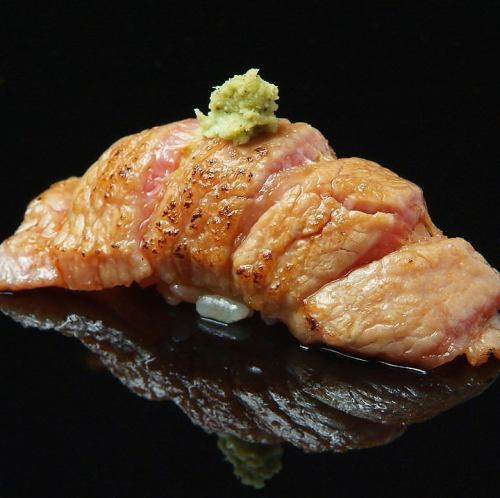 Broiled bluefin tuna meat sushi (1 piece)