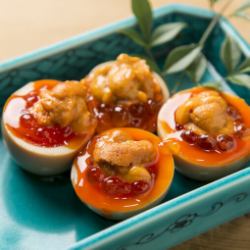 Soft-boiled egg topped with sea urchin roe